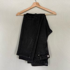 Nine West black distressed skinny jeans.